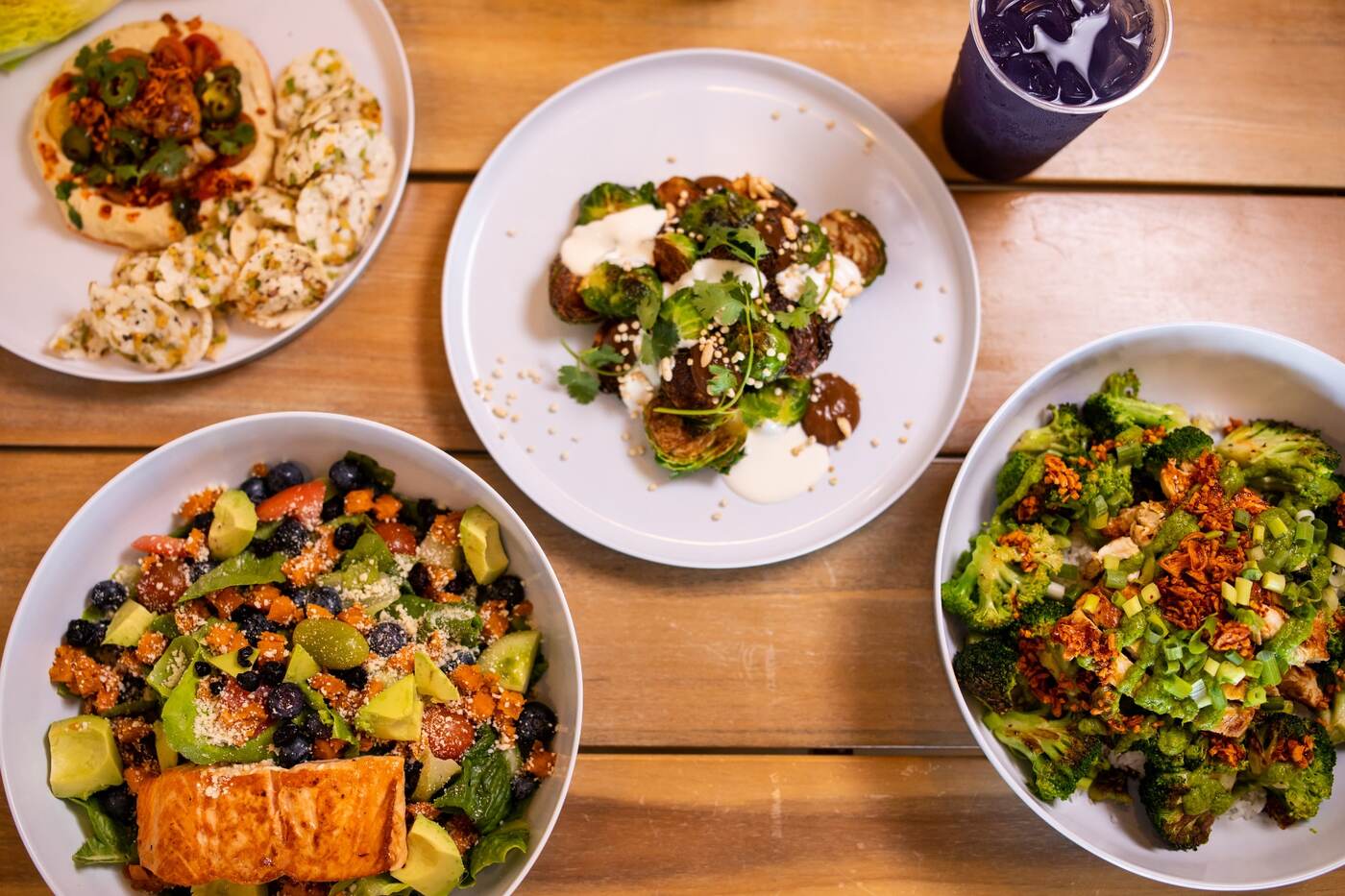 Overhead spread of McFlamingo dishes on a wood table