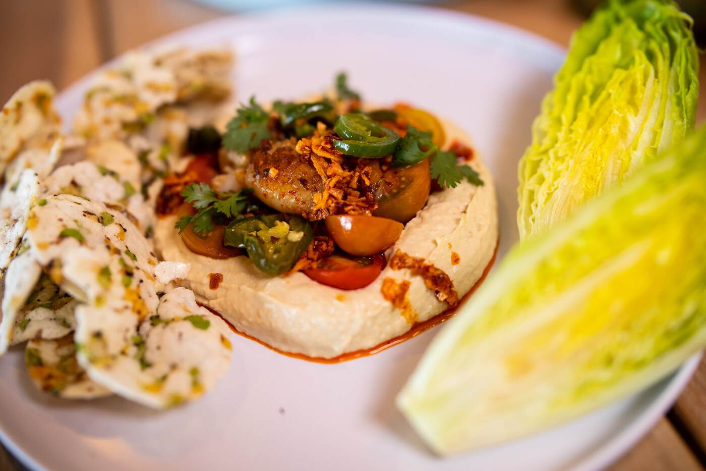 Jalapeño hummus plate with herb crackers at McFlamingo Ponte Vedra Beach